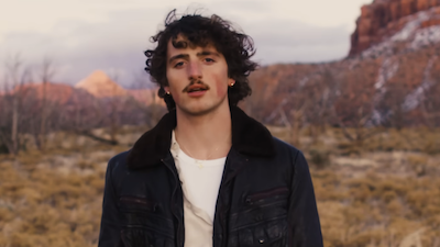 Photo of singer-songwriter Benson Boone.